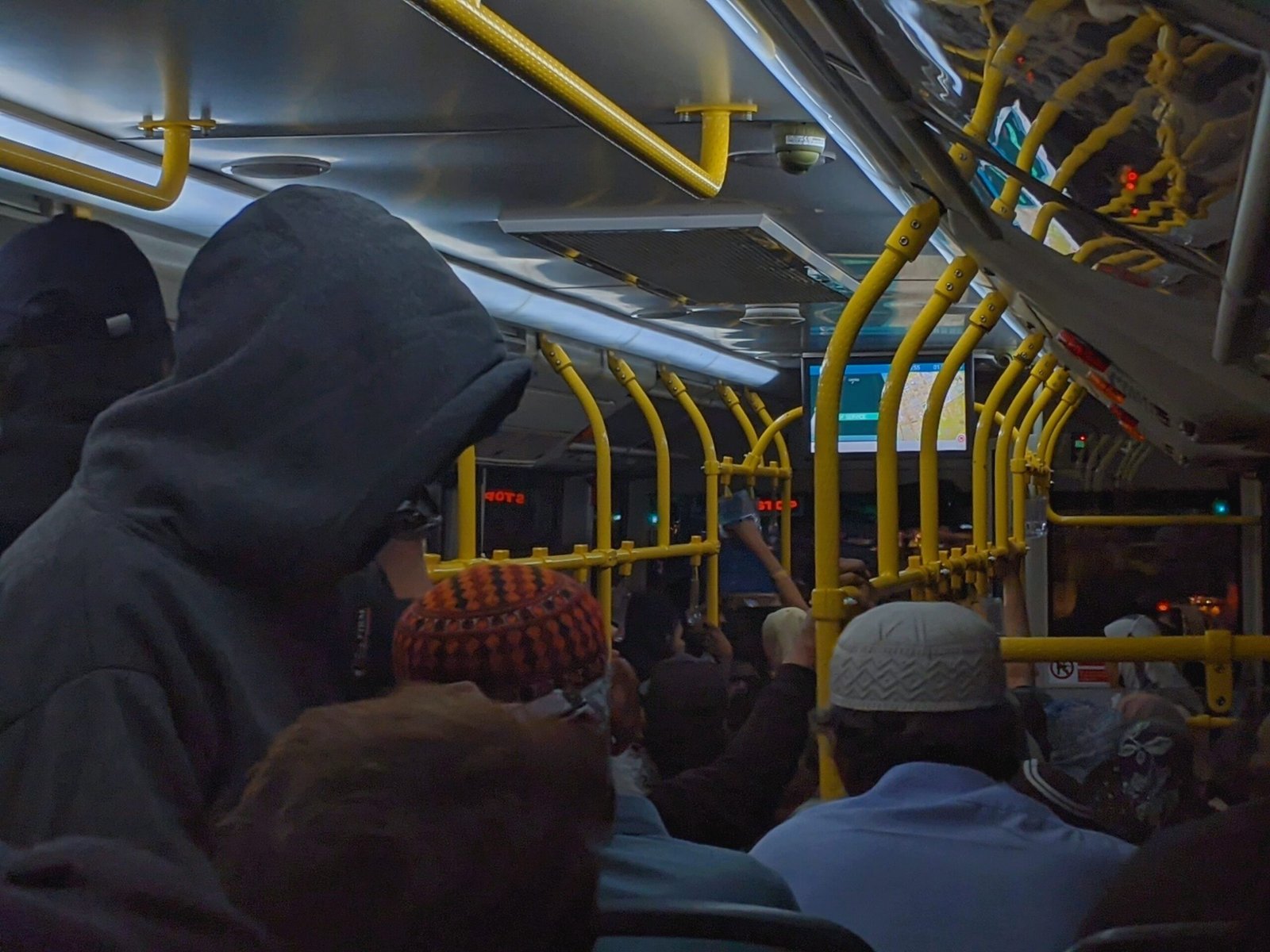 a group of people riding on a bus